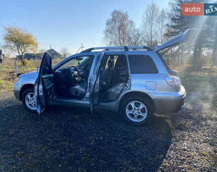 Серый Мицубиси Аутлендер, объемом двигателя 2 л и пробегом 250 тыс. км за 5700 $, фото 15 на Automoto.ua