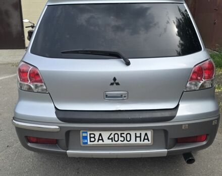 Серый Мицубиси Аутлендер, объемом двигателя 2 л и пробегом 300 тыс. км за 7000 $, фото 3 на Automoto.ua