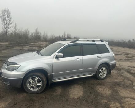 Сірий Міцубісі Аутлендер, об'ємом двигуна 2.4 л та пробігом 275 тис. км за 6400 $, фото 1 на Automoto.ua