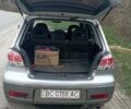 Серый Мицубиси Аутлендер, объемом двигателя 2 л и пробегом 412 тыс. км за 4800 $, фото 4 на Automoto.ua
