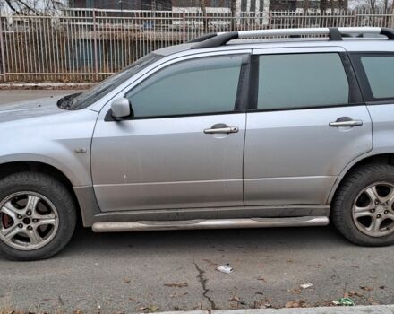 Серый Мицубиси Аутлендер, объемом двигателя 2 л и пробегом 240 тыс. км за 3900 $, фото 4 на Automoto.ua