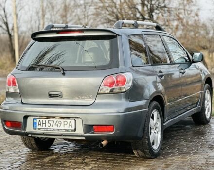 Сірий Міцубісі Аутлендер, об'ємом двигуна 2 л та пробігом 280 тис. км за 3500 $, фото 4 на Automoto.ua