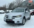 Серый Мицубиси Аутлендер, объемом двигателя 2 л и пробегом 182 тыс. км за 5400 $, фото 1 на Automoto.ua