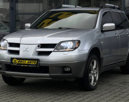 Сірий Міцубісі Аутлендер, об'ємом двигуна 2.4 л та пробігом 240 тис. км за 6700 $, фото 2 на Automoto.ua
