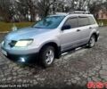Серый Мицубиси Аутлендер, объемом двигателя 2 л и пробегом 0 тыс. км за 5000 $, фото 9 на Automoto.ua
