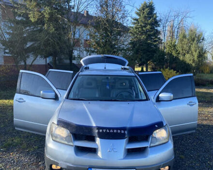 Серый Мицубиси Аутлендер, объемом двигателя 2 л и пробегом 250 тыс. км за 5700 $, фото 14 на Automoto.ua