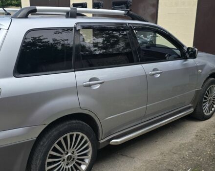 Серый Мицубиси Аутлендер, объемом двигателя 2 л и пробегом 300 тыс. км за 7000 $, фото 4 на Automoto.ua