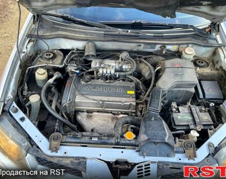 Сірий Міцубісі Аутлендер, об'ємом двигуна 2 л та пробігом 333 тис. км за 4850 $, фото 11 на Automoto.ua