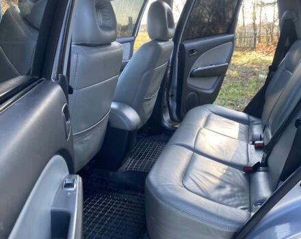 Серый Мицубиси Аутлендер, объемом двигателя 2 л и пробегом 250 тыс. км за 5700 $, фото 9 на Automoto.ua