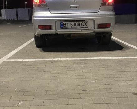 Серый Мицубиси Аутлендер, объемом двигателя 2.4 л и пробегом 285 тыс. км за 4600 $, фото 3 на Automoto.ua