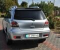 Серый Мицубиси Аутлендер, объемом двигателя 2.4 л и пробегом 280 тыс. км за 6000 $, фото 2 на Automoto.ua