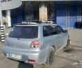 Серый Мицубиси Аутлендер, объемом двигателя 2 л и пробегом 320 тыс. км за 7300 $, фото 4 на Automoto.ua