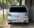 Сірий Міцубісі Аутлендер, об'ємом двигуна 2 л та пробігом 227 тис. км за 8500 $, фото 3 на Automoto.ua