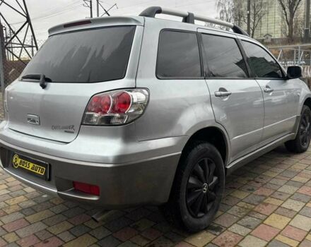 Сірий Міцубісі Аутлендер, об'ємом двигуна 2.4 л та пробігом 256 тис. км за 6700 $, фото 6 на Automoto.ua
