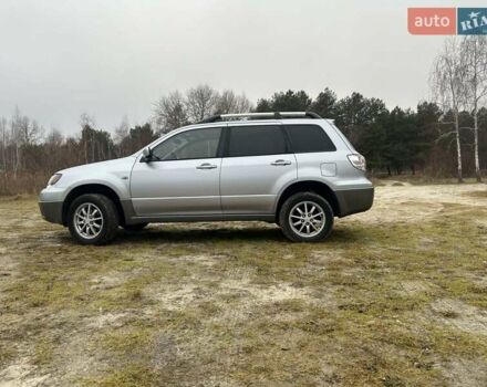 Серый Мицубиси Аутлендер, объемом двигателя 2.4 л и пробегом 265 тыс. км за 6400 $, фото 2 на Automoto.ua