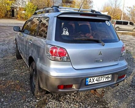 Серый Мицубиси Аутлендер, объемом двигателя 2.4 л и пробегом 317 тыс. км за 5200 $, фото 3 на Automoto.ua