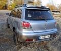 Серый Мицубиси Аутлендер, объемом двигателя 2.4 л и пробегом 317 тыс. км за 5200 $, фото 3 на Automoto.ua