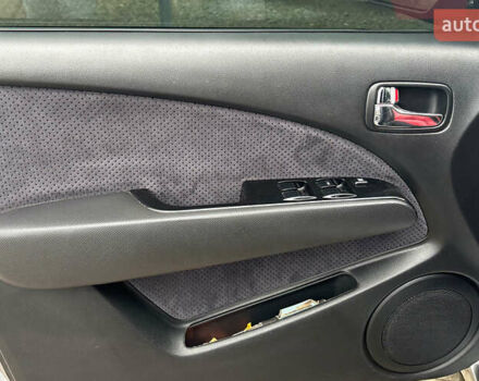 Серый Мицубиси Аутлендер, объемом двигателя 2.38 л и пробегом 256 тыс. км за 6700 $, фото 17 на Automoto.ua