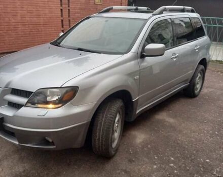 Серый Мицубиси Аутлендер, объемом двигателя 2.4 л и пробегом 265 тыс. км за 6400 $, фото 6 на Automoto.ua