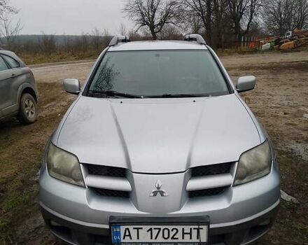 Серый Мицубиси Аутлендер, объемом двигателя 2.38 л и пробегом 255 тыс. км за 6000 $, фото 3 на Automoto.ua