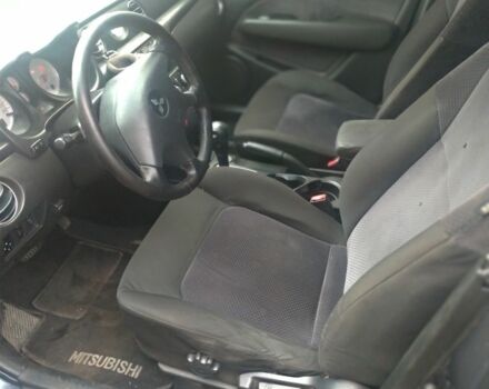 Серый Мицубиси Аутлендер, объемом двигателя 2.4 л и пробегом 286 тыс. км за 7400 $, фото 8 на Automoto.ua