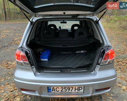 Серый Мицубиси Аутлендер, объемом двигателя 2 л и пробегом 239 тыс. км за 5800 $, фото 6 на Automoto.ua