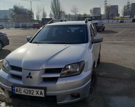 Серый Мицубиси Аутлендер, объемом двигателя 2 л и пробегом 320 тыс. км за 7300 $, фото 5 на Automoto.ua