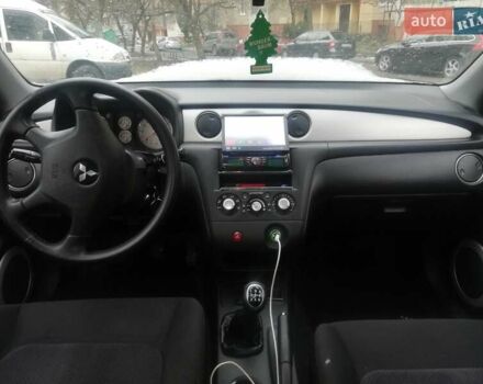 Серый Мицубиси Аутлендер, объемом двигателя 2.4 л и пробегом 138 тыс. км за 7000 $, фото 9 на Automoto.ua