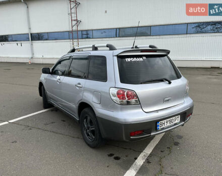 Сірий Міцубісі Аутлендер, об'ємом двигуна 2.38 л та пробігом 252 тис. км за 5400 $, фото 4 на Automoto.ua