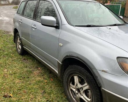 Серый Мицубиси Аутлендер, объемом двигателя 2.38 л и пробегом 432 тыс. км за 4700 $, фото 10 на Automoto.ua
