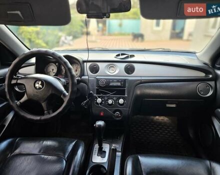 Сірий Міцубісі Аутлендер, об'ємом двигуна 2.4 л та пробігом 161 тис. км за 7500 $, фото 3 на Automoto.ua