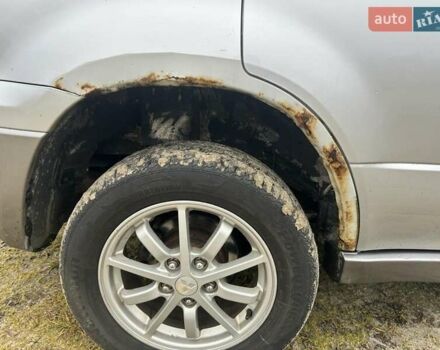 Серый Мицубиси Аутлендер, объемом двигателя 2.4 л и пробегом 265 тыс. км за 6400 $, фото 1 на Automoto.ua