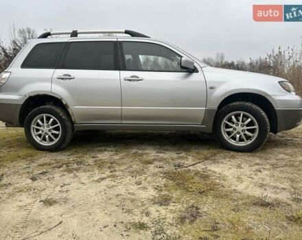 Серый Мицубиси Аутлендер, объемом двигателя 2.4 л и пробегом 265 тыс. км за 6400 $, фото 4 на Automoto.ua