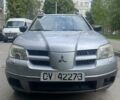 Серый Мицубиси Аутлендер, объемом двигателя 0 л и пробегом 275 тыс. км за 3000 $, фото 1 на Automoto.ua