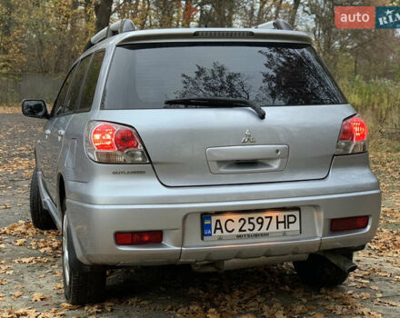 Серый Мицубиси Аутлендер, объемом двигателя 2 л и пробегом 239 тыс. км за 5800 $, фото 4 на Automoto.ua