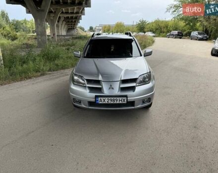 Серый Мицубиси Аутлендер, объемом двигателя 2.35 л и пробегом 358 тыс. км за 3999 $, фото 1 на Automoto.ua