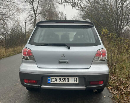 Серый Мицубиси Аутлендер, объемом двигателя 2.38 л и пробегом 432 тыс. км за 4700 $, фото 3 на Automoto.ua