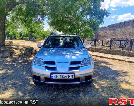 Серый Мицубиси Аутлендер, объемом двигателя 2.4 л и пробегом 270 тыс. км за 4999 $, фото 3 на Automoto.ua