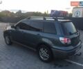 Сірий Міцубісі Аутлендер, об'ємом двигуна 2 л та пробігом 316 тис. км за 5900 $, фото 3 на Automoto.ua