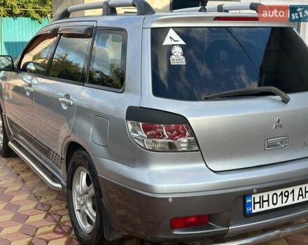 Сірий Міцубісі Аутлендер, об'ємом двигуна 2.4 л та пробігом 161 тис. км за 7500 $, фото 6 на Automoto.ua