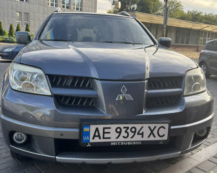 Серый Мицубиси Аутлендер, объемом двигателя 2.4 л и пробегом 266 тыс. км за 6500 $, фото 4 на Automoto.ua