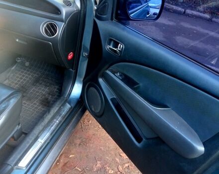 Серый Мицубиси Аутлендер, объемом двигателя 2.4 л и пробегом 204 тыс. км за 5600 $, фото 2 на Automoto.ua