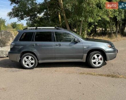Серый Мицубиси Аутлендер, объемом двигателя 2.4 л и пробегом 276 тыс. км за 6299 $, фото 4 на Automoto.ua