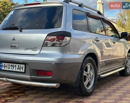 Сірий Міцубісі Аутлендер, об'ємом двигуна 2.4 л та пробігом 161 тис. км за 7500 $, фото 5 на Automoto.ua