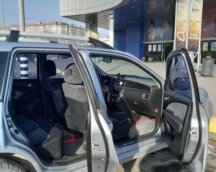 Серый Мицубиси Аутлендер, объемом двигателя 2 л и пробегом 320 тыс. км за 7300 $, фото 1 на Automoto.ua