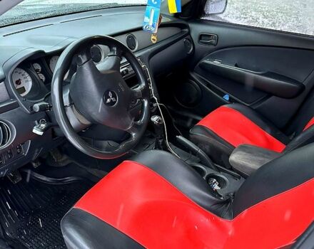 Серый Мицубиси Аутлендер, объемом двигателя 2 л и пробегом 390 тыс. км за 5400 $, фото 6 на Automoto.ua