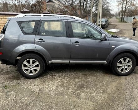Серый Мицубиси Аутлендер, объемом двигателя 2 л и пробегом 290 тыс. км за 4500 $, фото 6 на Automoto.ua