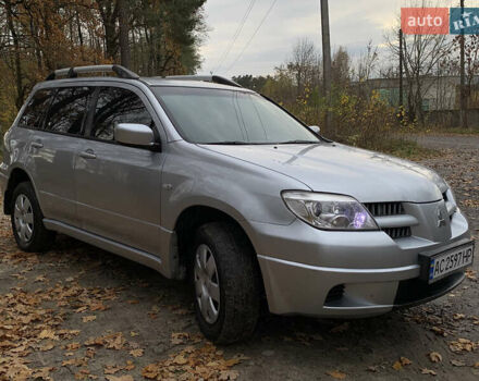 Серый Мицубиси Аутлендер, объемом двигателя 2 л и пробегом 239 тыс. км за 5800 $, фото 9 на Automoto.ua