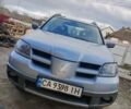 Сірий Міцубісі Аутлендер, об'ємом двигуна 2.4 л та пробігом 34 тис. км за 5200 $, фото 1 на Automoto.ua