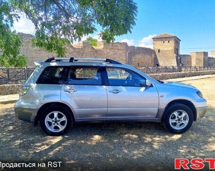 Серый Мицубиси Аутлендер, объемом двигателя 2.4 л и пробегом 270 тыс. км за 4999 $, фото 4 на Automoto.ua